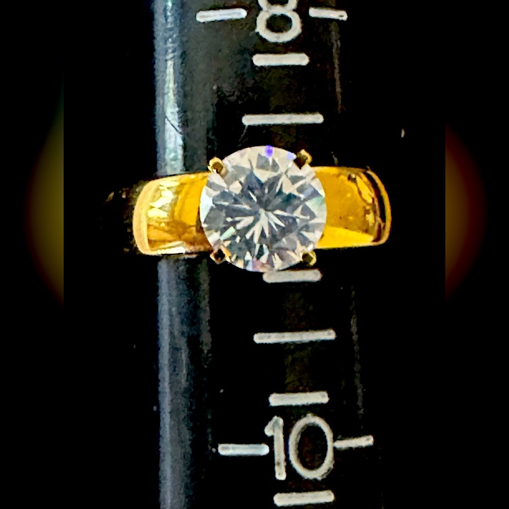 Gold Solitaire Ring with Clear Center Stone